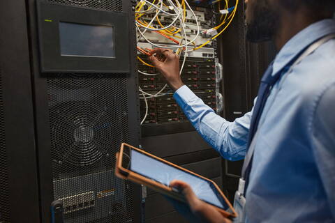 network-engineer-in-server-room-2021-04-06-16-33-47-utc